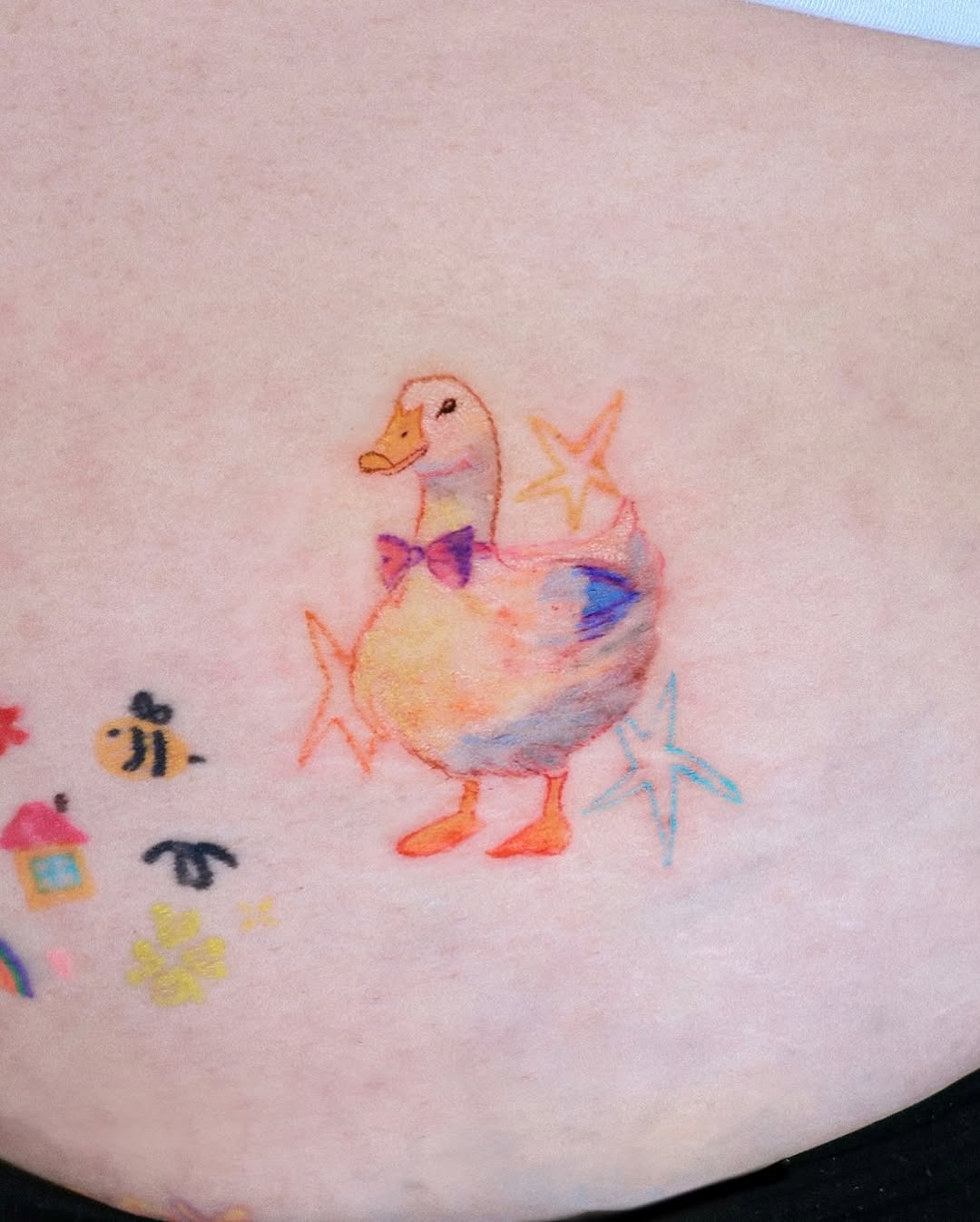 Cute colorful duck tattoo with whimsical vibes Tattoo Design