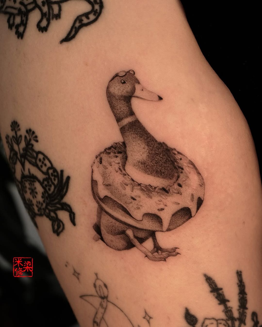 Quirky Duck with a Doughnut Float Tattoo Design