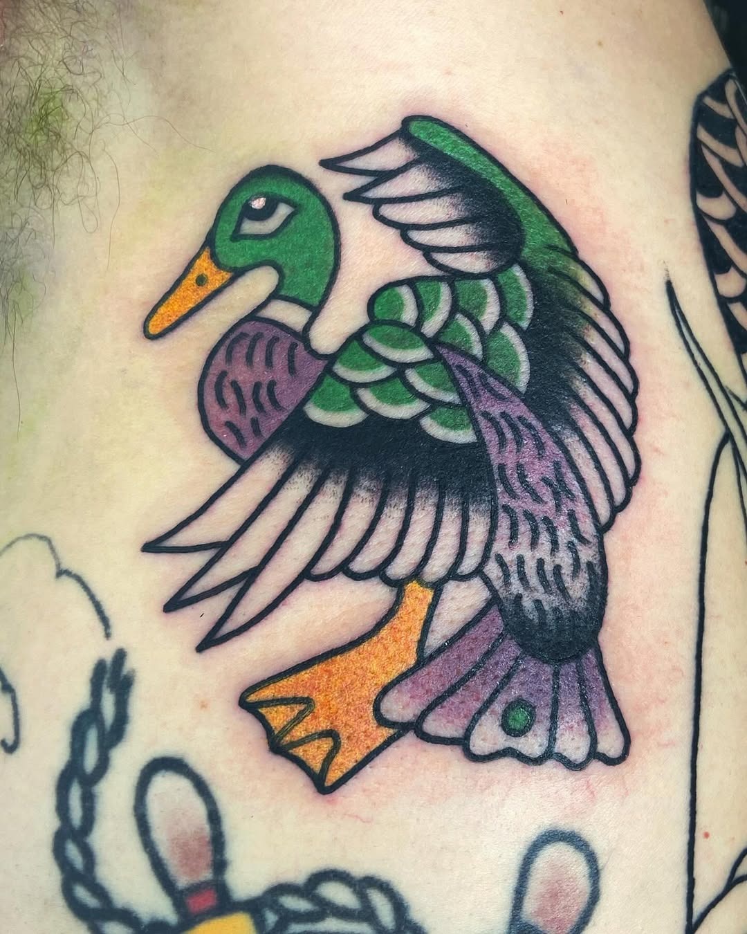 Vibrant Duck Tattoo with Bold Colors Tattoo Design