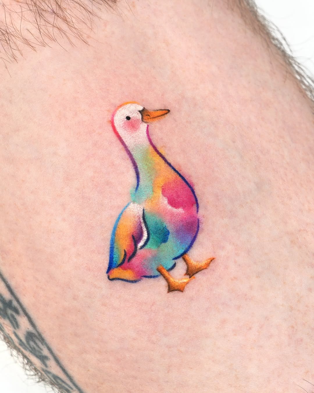 Whimsical duck tattoo in vibrant colors Tattoo Design