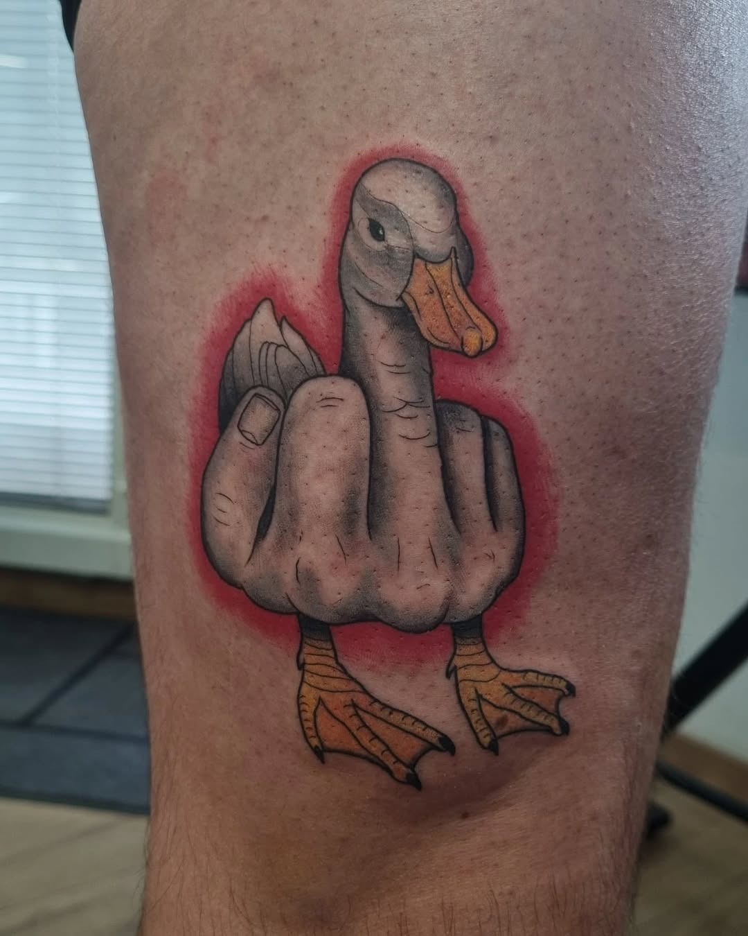 Whimsical duck tattoo with a unique twist Tattoo Design