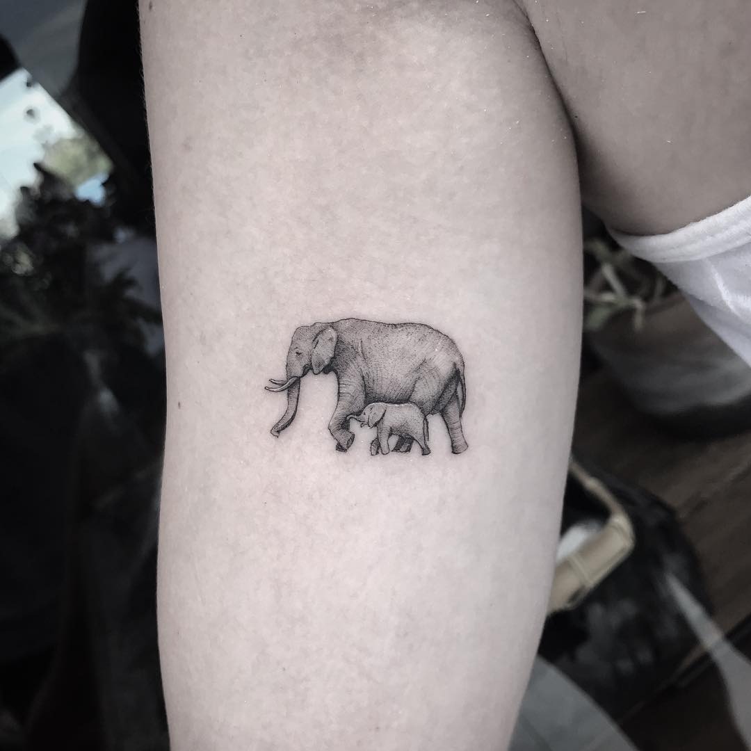 Beautiful elephant family tattoo on the forearm Tattoo Design