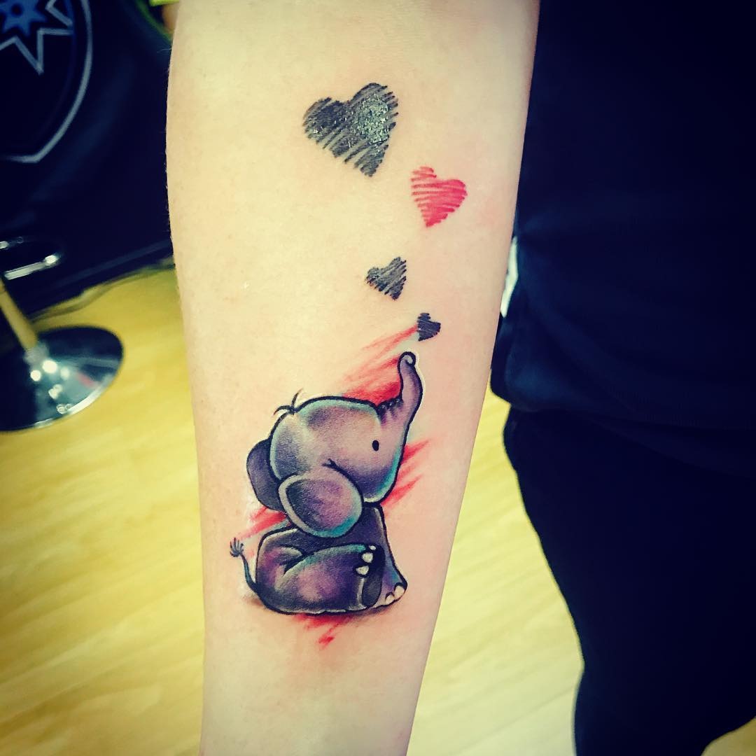 Charming Elephant Tattoo with Heart Accents Tattoo Design