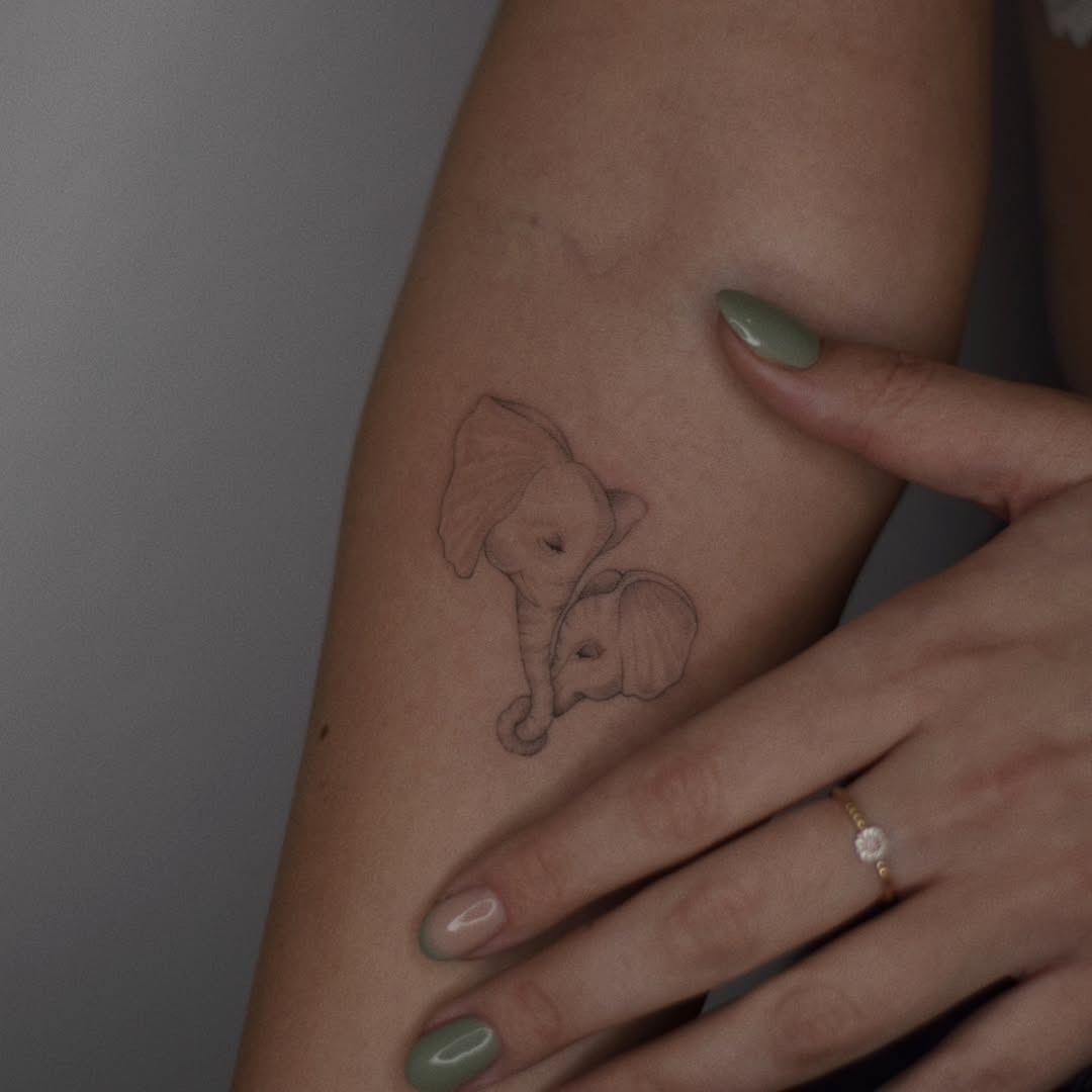 Delicate minimalist elephant tattoo design Tattoo Design