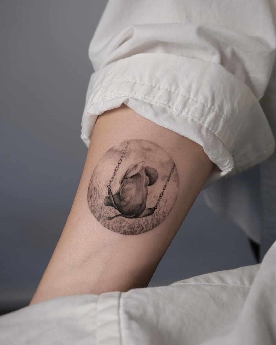 Elegant Elephant Tattoo on a Swing Tattoo Design