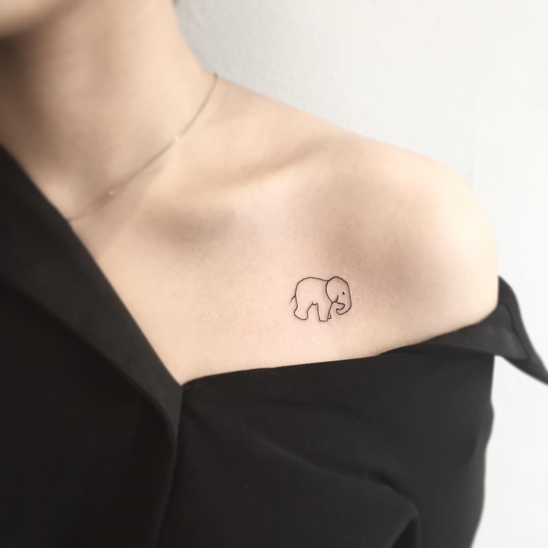 Elegant Minimalist Elephant Tattoo on Shoulder Tattoo Design