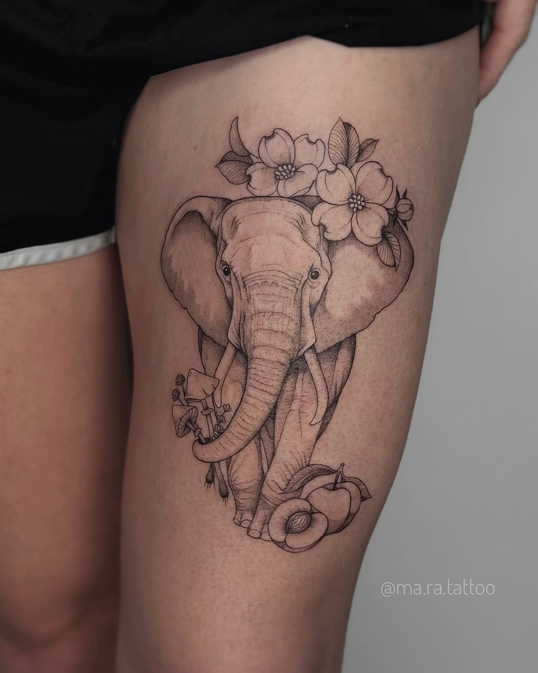 Elegant tattoo featuring an artistic elephant design Tattoo Design