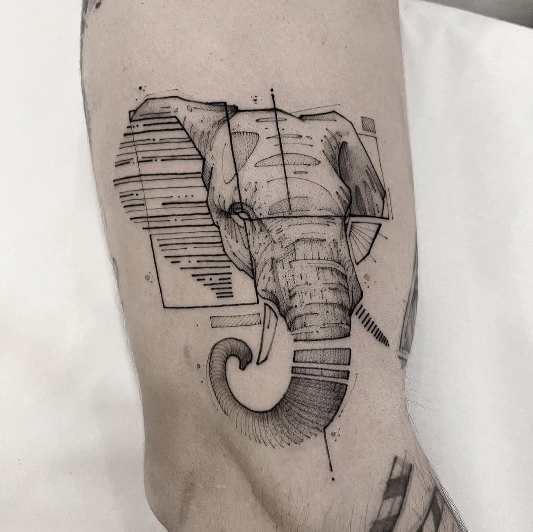 Geometric elephant head tattoo with sharp lines Tattoo Design