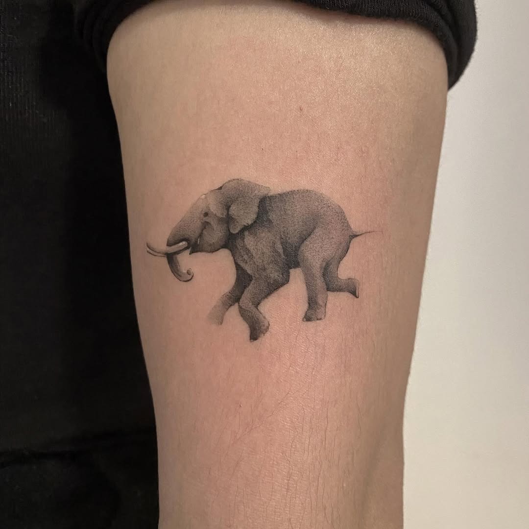 Graceful Running Elephant Tattoo Design Tattoo Design
