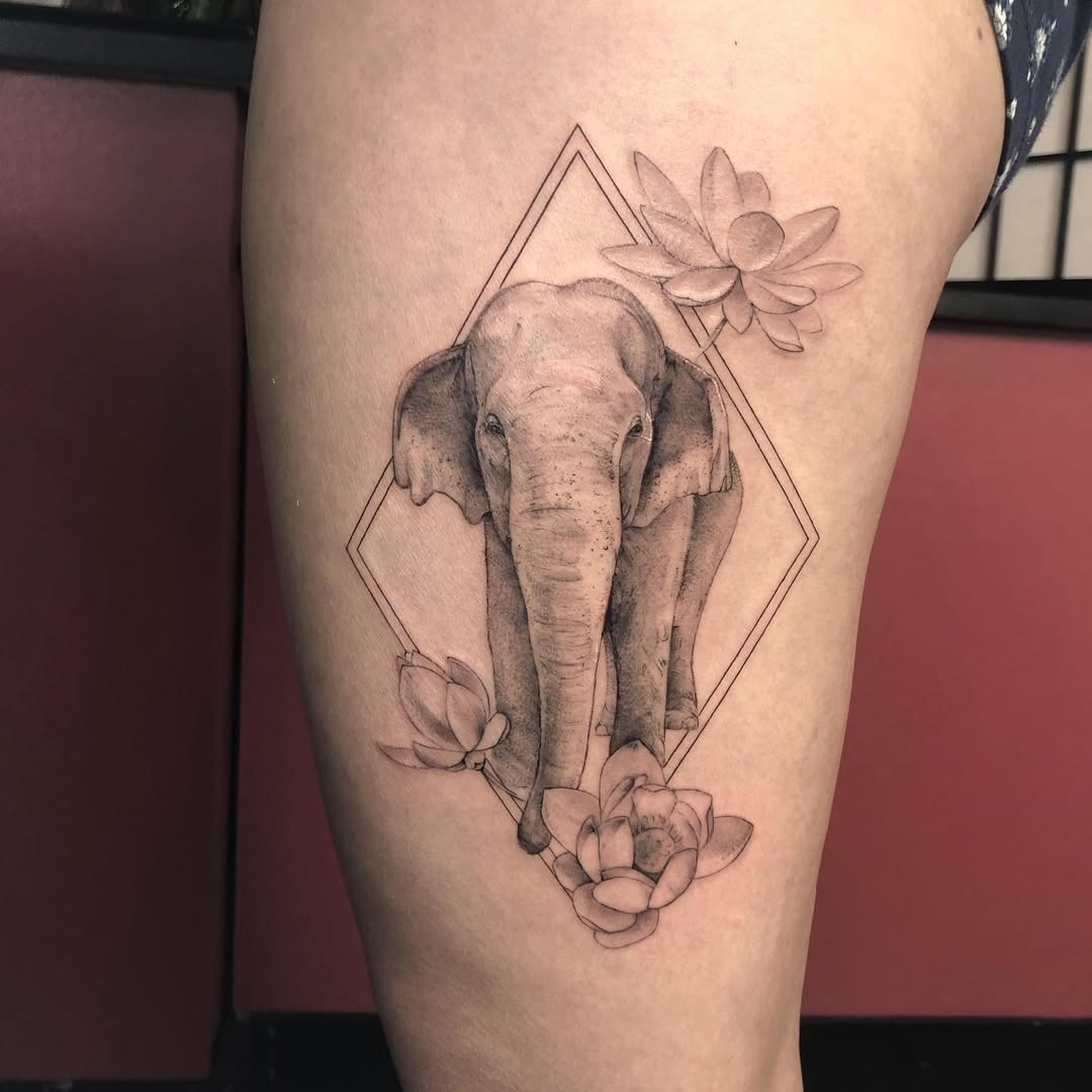 Intricate Elephant Tattoo With Lotus Accents Tattoo Design