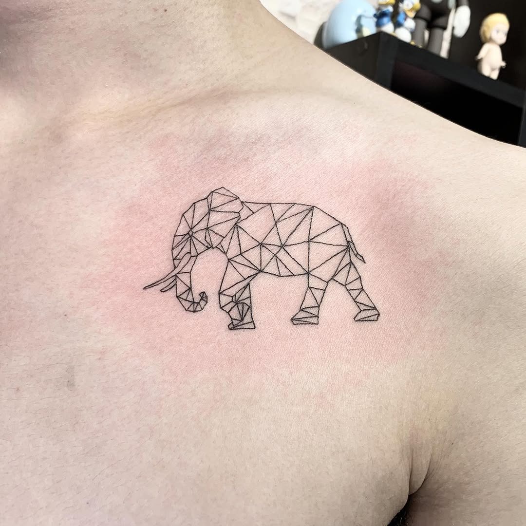 Unique Polygonal Elephant Tattoo on Shoulder Tattoo Design