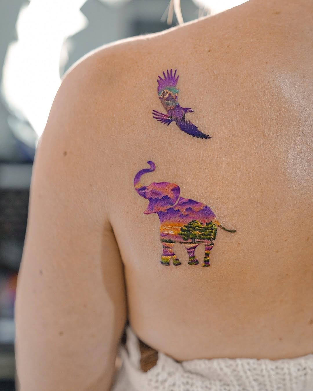 Vibrant Elephant and Bird Tattoo Design Tattoo Design