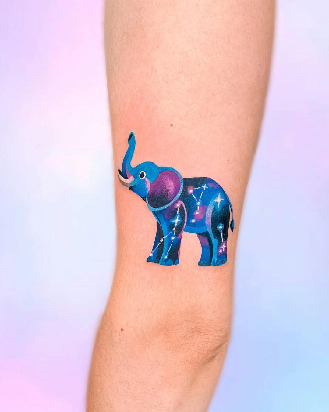 Vibrant elephant tattoo showcasing cosmic themes Tattoo Design