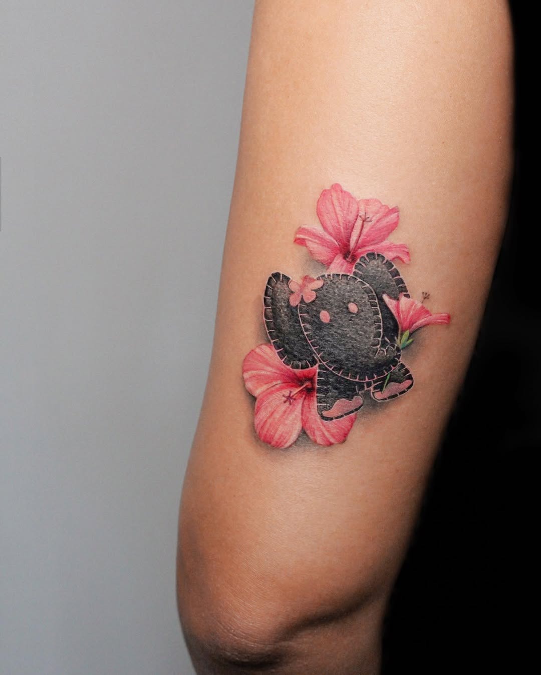 Whimsical elephant tattoo with floral accents Tattoo Design