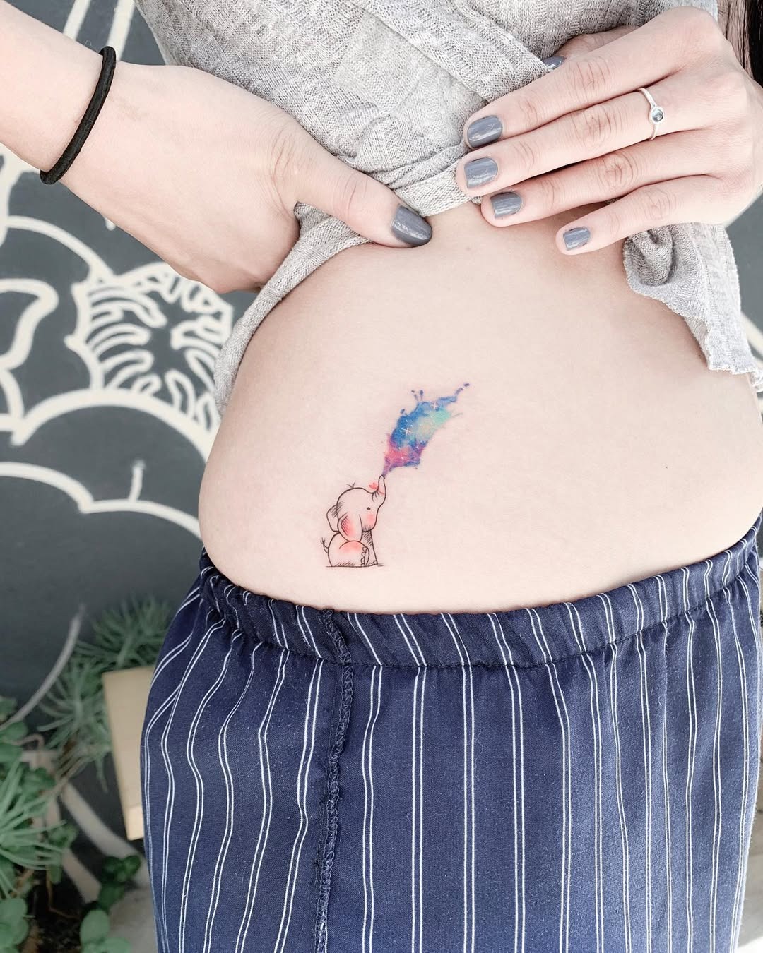 Whimsical watercolor elephant tattoo design Tattoo Design