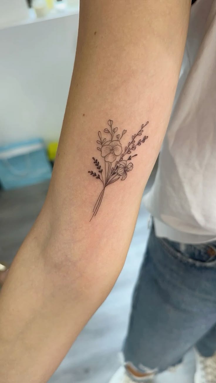 Elegant Violet on the Spine Tattoo Design