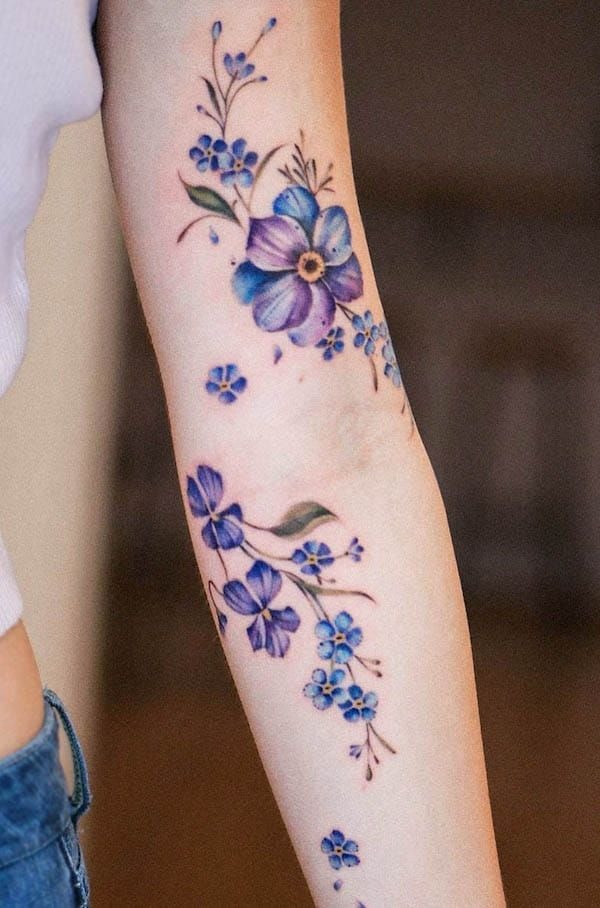 Trio of Simple Violet Blooms Tattoo Design