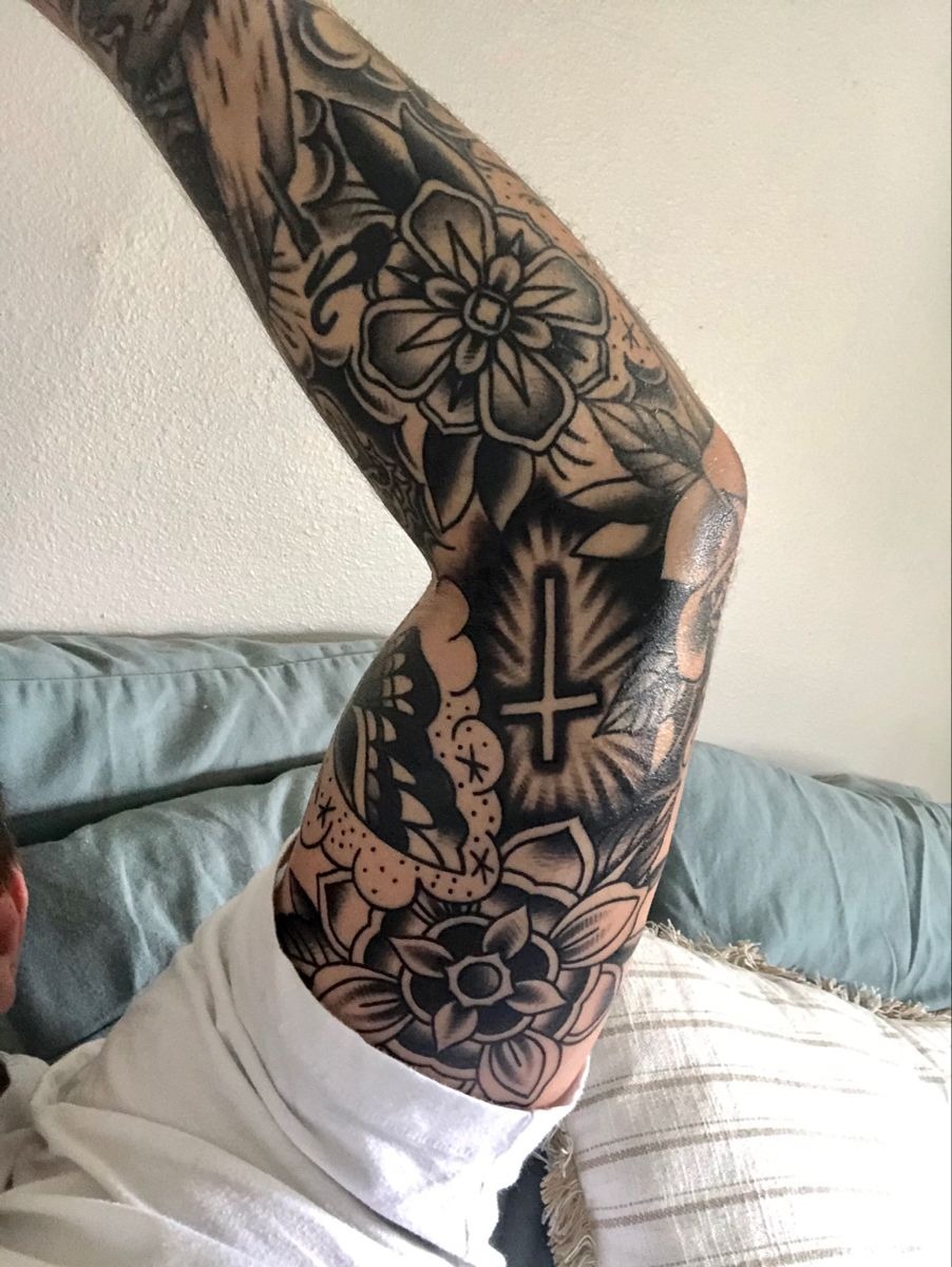Bold Black Elbow Cross Filler Tattoo Design