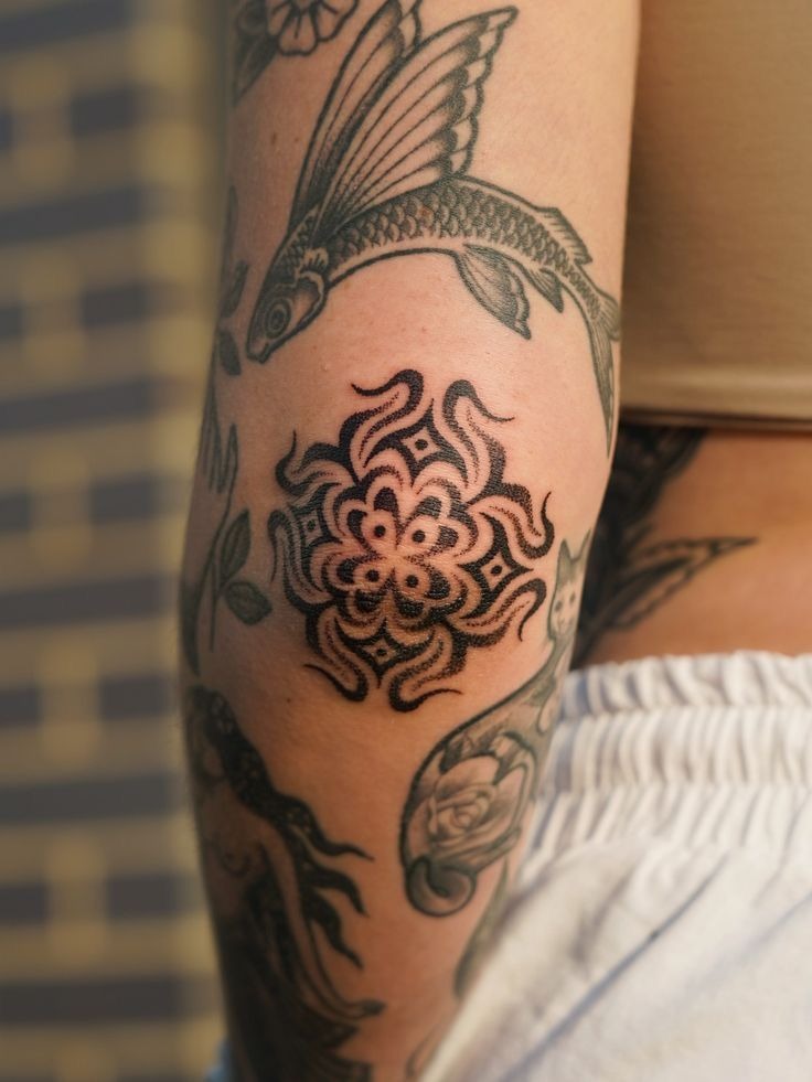 Compact Ornamental Elbow Medallion Tattoo Design