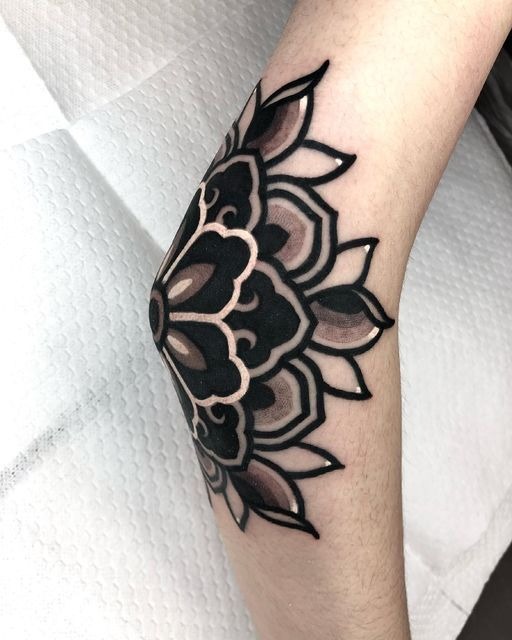 Dark Petal Elbow Shield Tattoo Design
