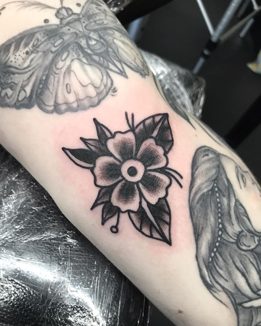 Tiny Traditional Flower Gap Filler Tattoo Design