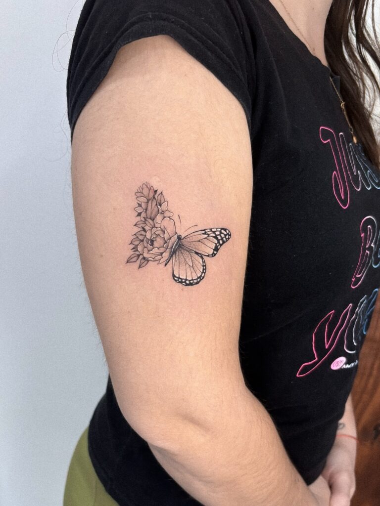 Butterfly and Flower Fusion on the Arm Tattoo Design