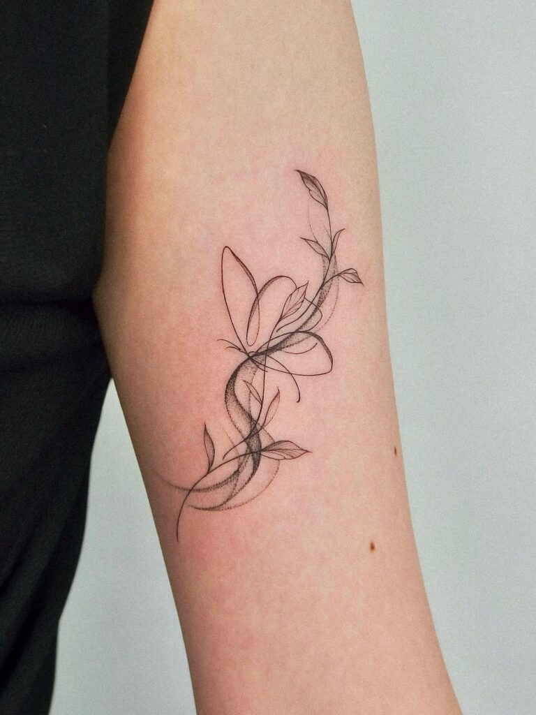 Butterfly and Flowing Vine Tattoo Tattoo Design