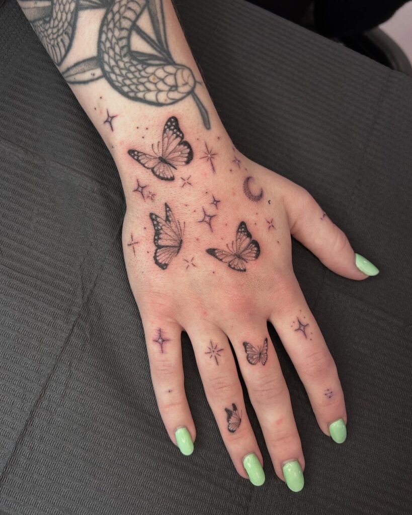 Butterfly and Moon Hand Tattoo Tattoo Design