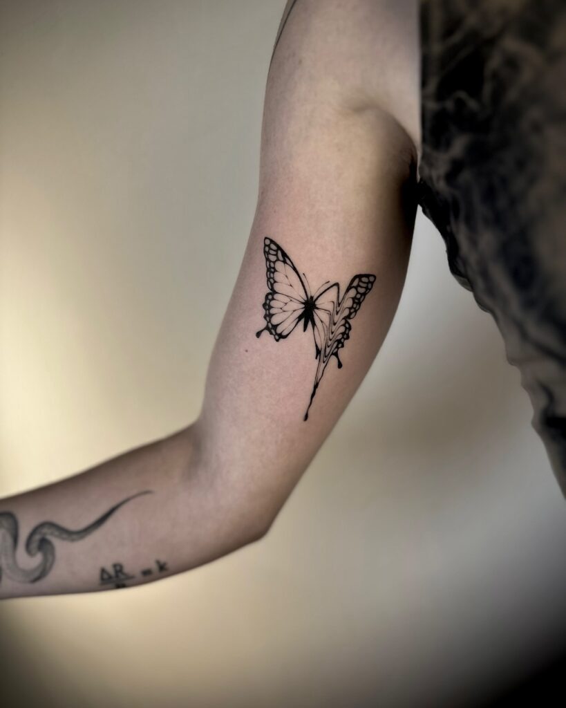 Butterfly with Melting Wing Tattoo Tattoo Design