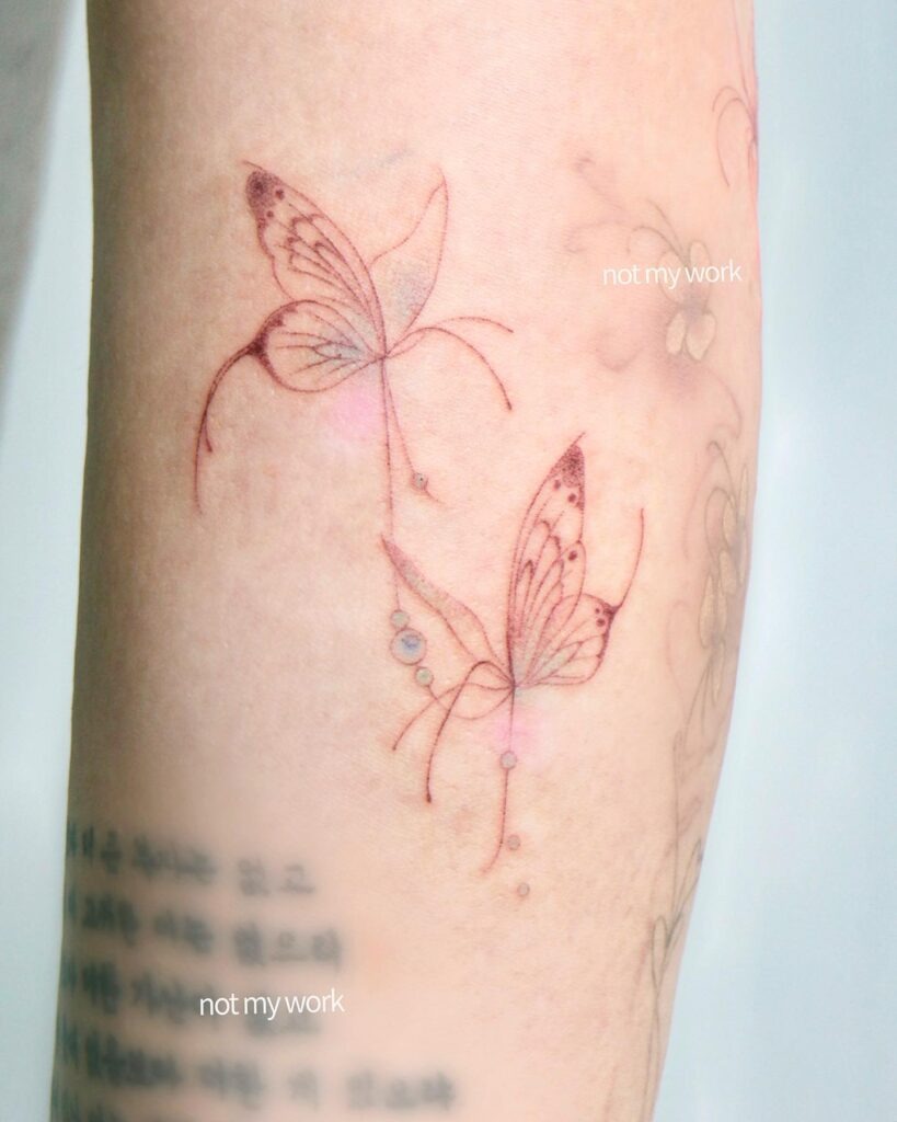 Flowing Fine Line Butterfly Pair Tattoo Design