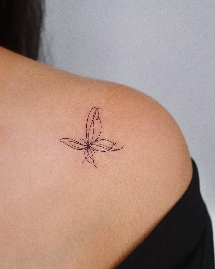 Minimalist Abstract Butterfly Tattoo on Shoulder Tattoo Design