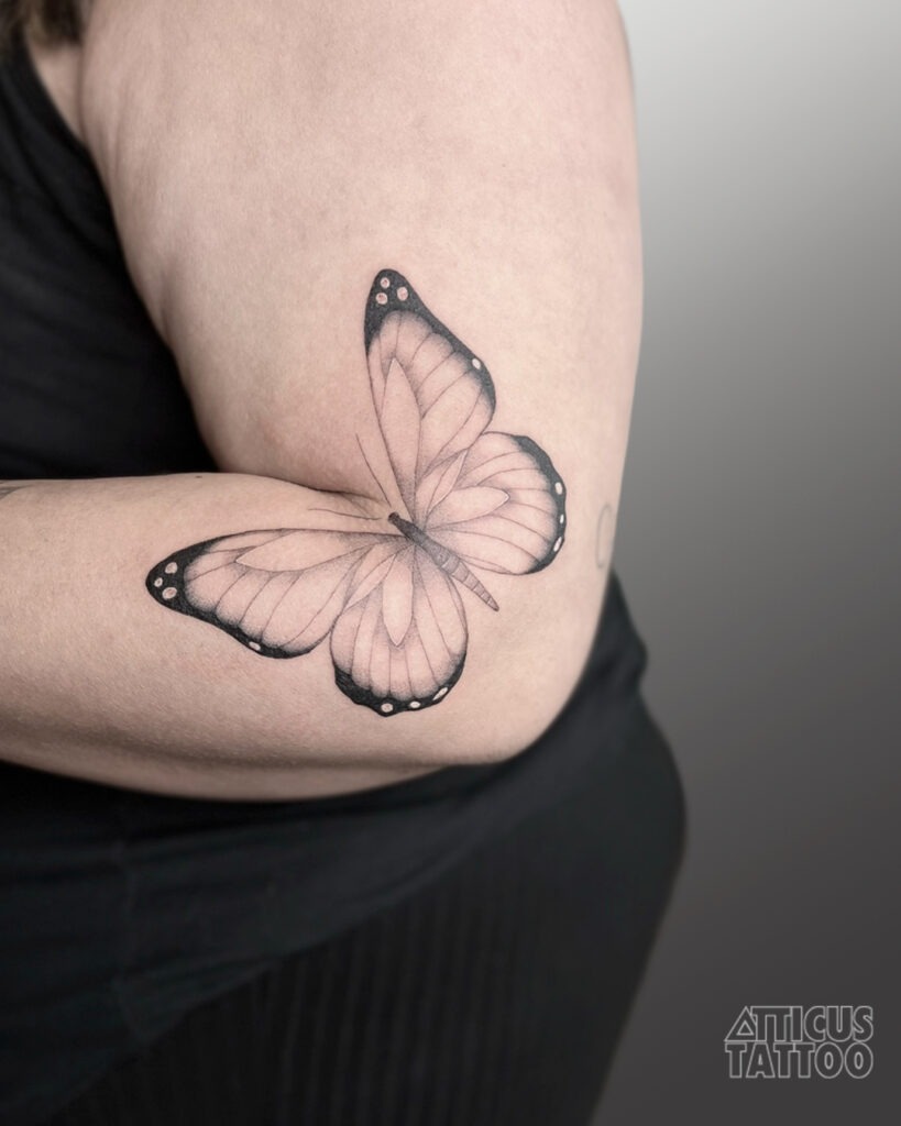 Shaded Butterfly on the Arm Tattoo Design