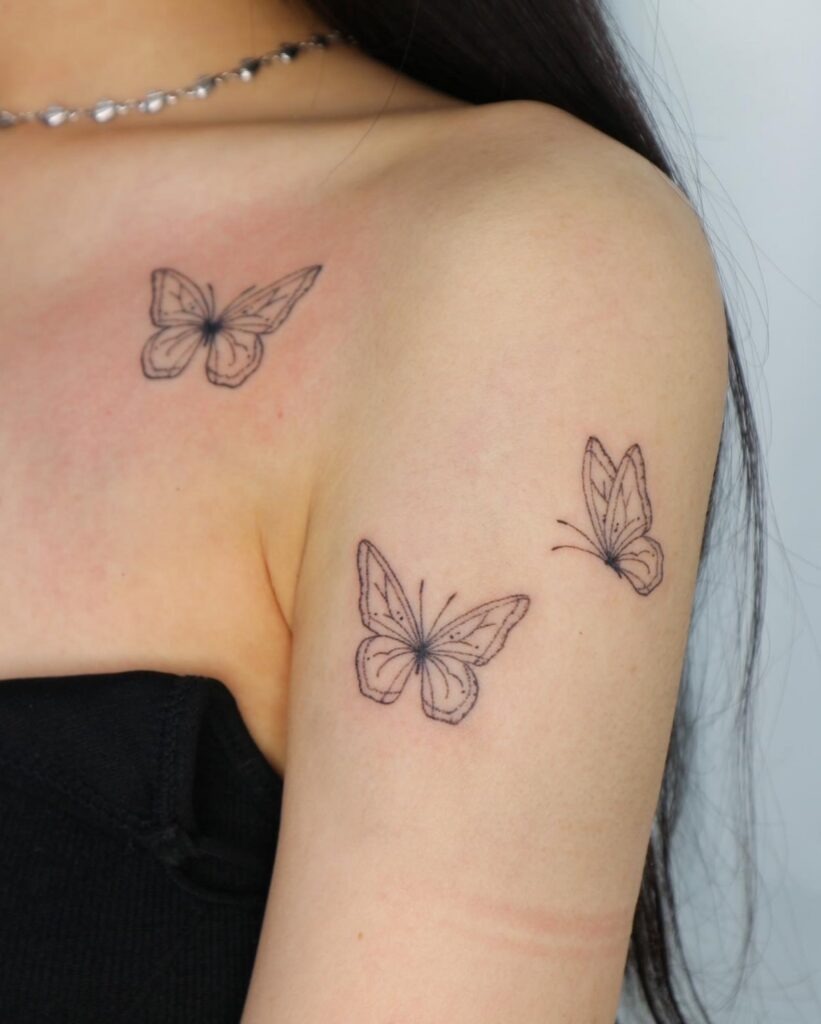 Three Fine Line Butterflies on Shoulder and Arm Tattoo Design