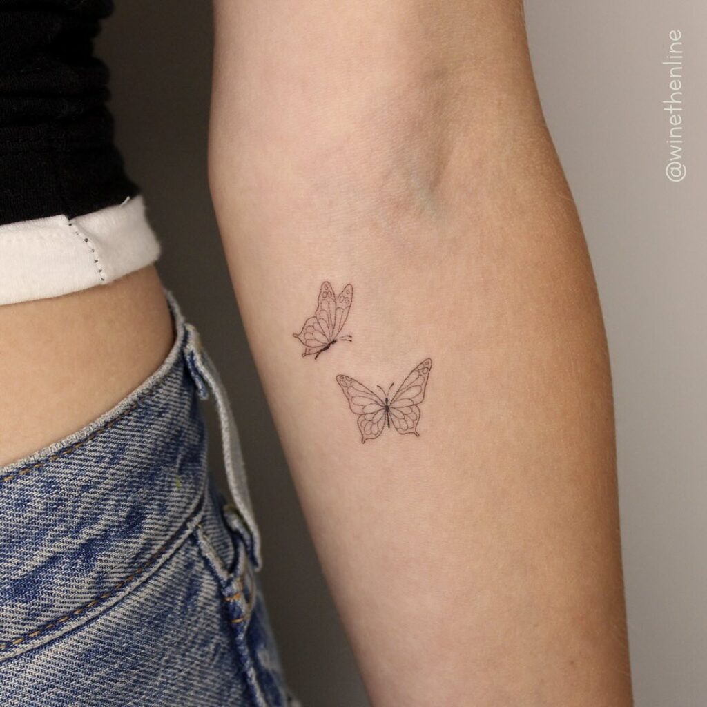 Two Delicate Fine Line Butterflies Tattoo Design