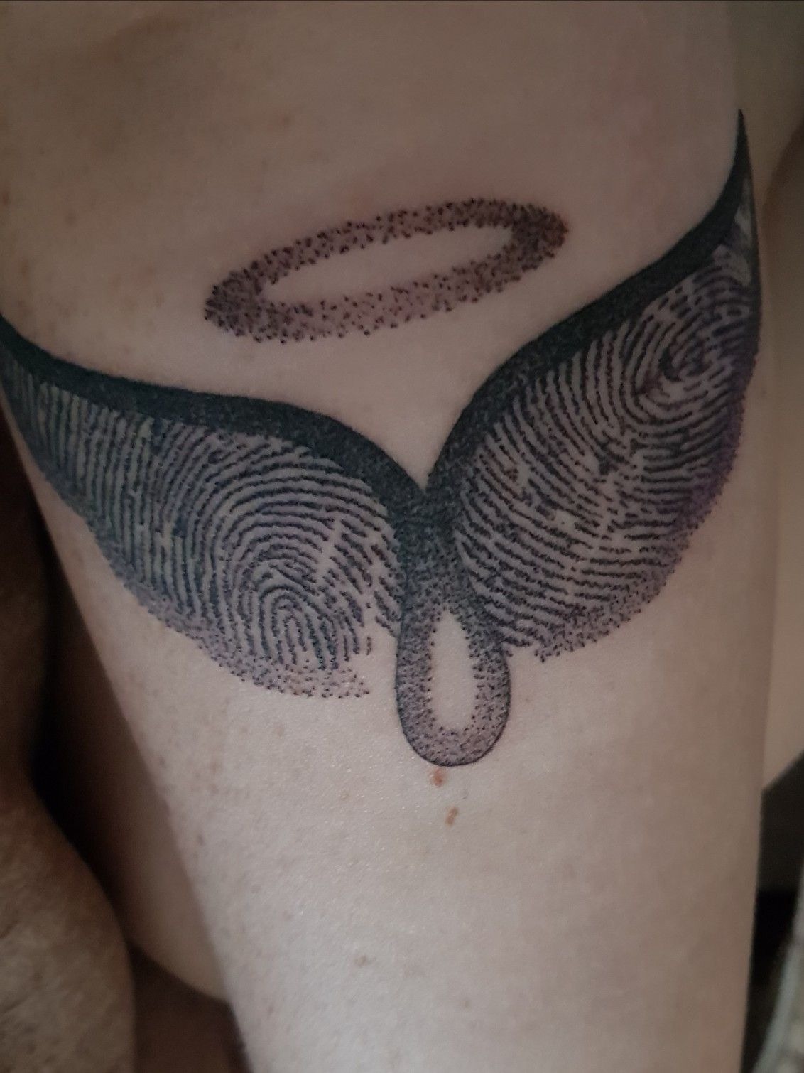 Fingerprint Butterfly with Halo Tattoo Tattoo Design