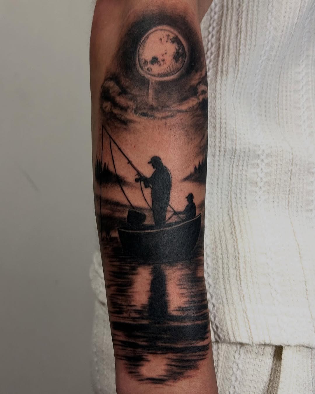 Captivating fishing scene with moonlit vibes Tattoo Design