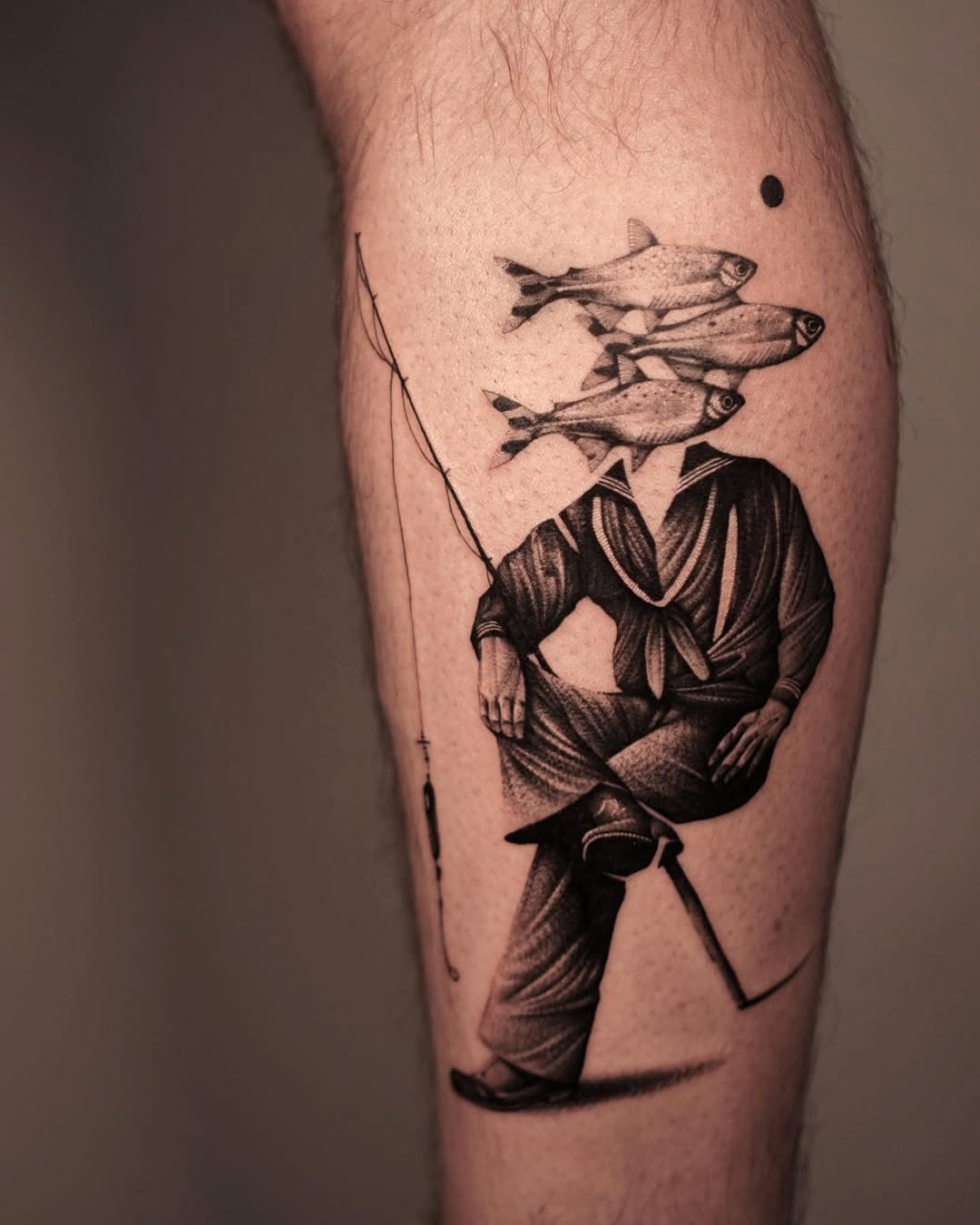 Creative Fisherman Tattoo with Fish Heads Tattoo Design