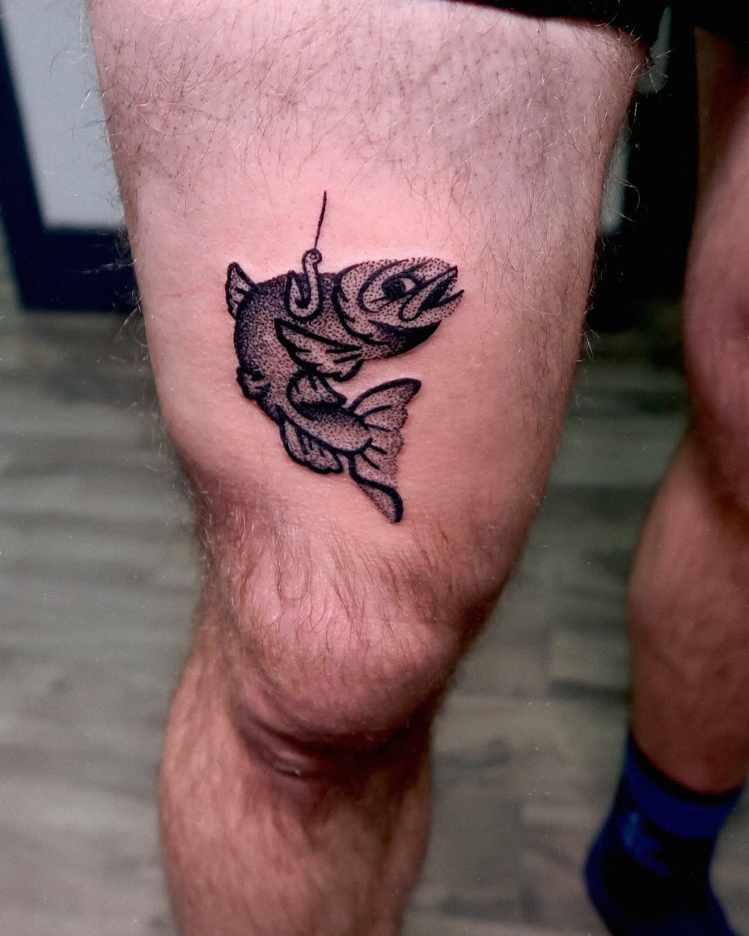 Dynamic fishing tattoo capturing thrill of the catch Tattoo Design