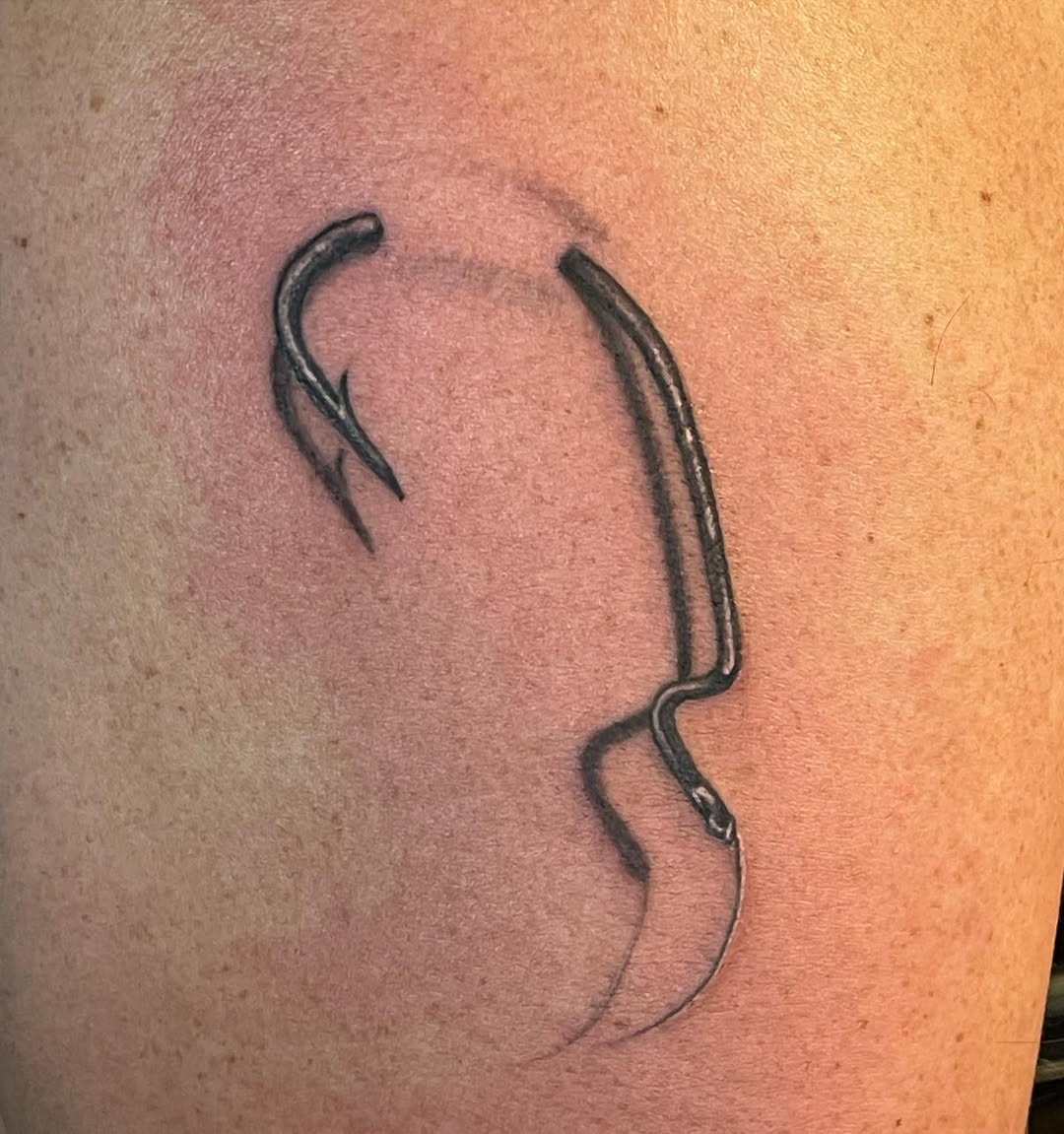 Stylish fishing hook tattoo in minimalist design Tattoo Design