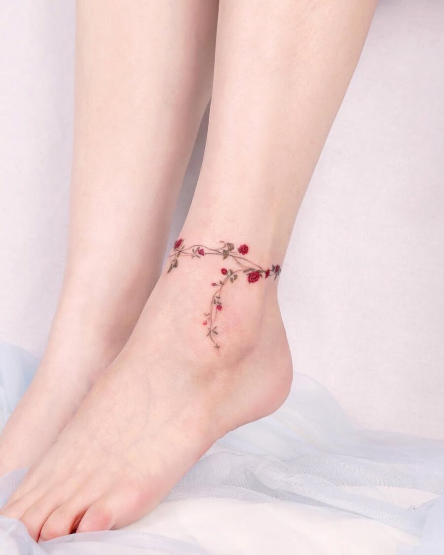 Delicate floral ankle tattoo design with grace Tattoo Design