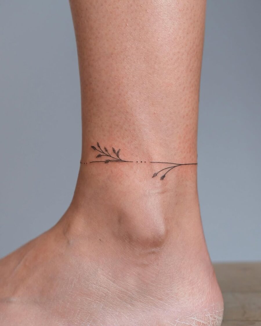 Delicate floral design gracing the ankle. Tattoo Design