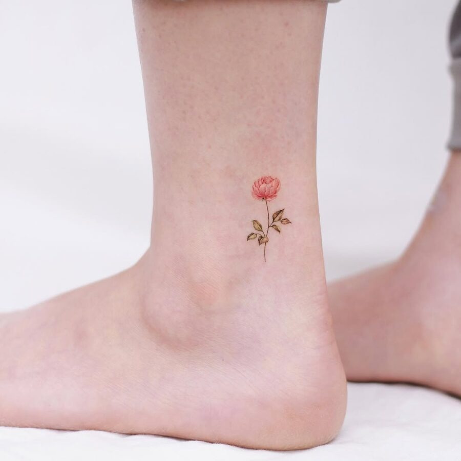 Delicate pink rose ankle tattoo in bloom Tattoo Design