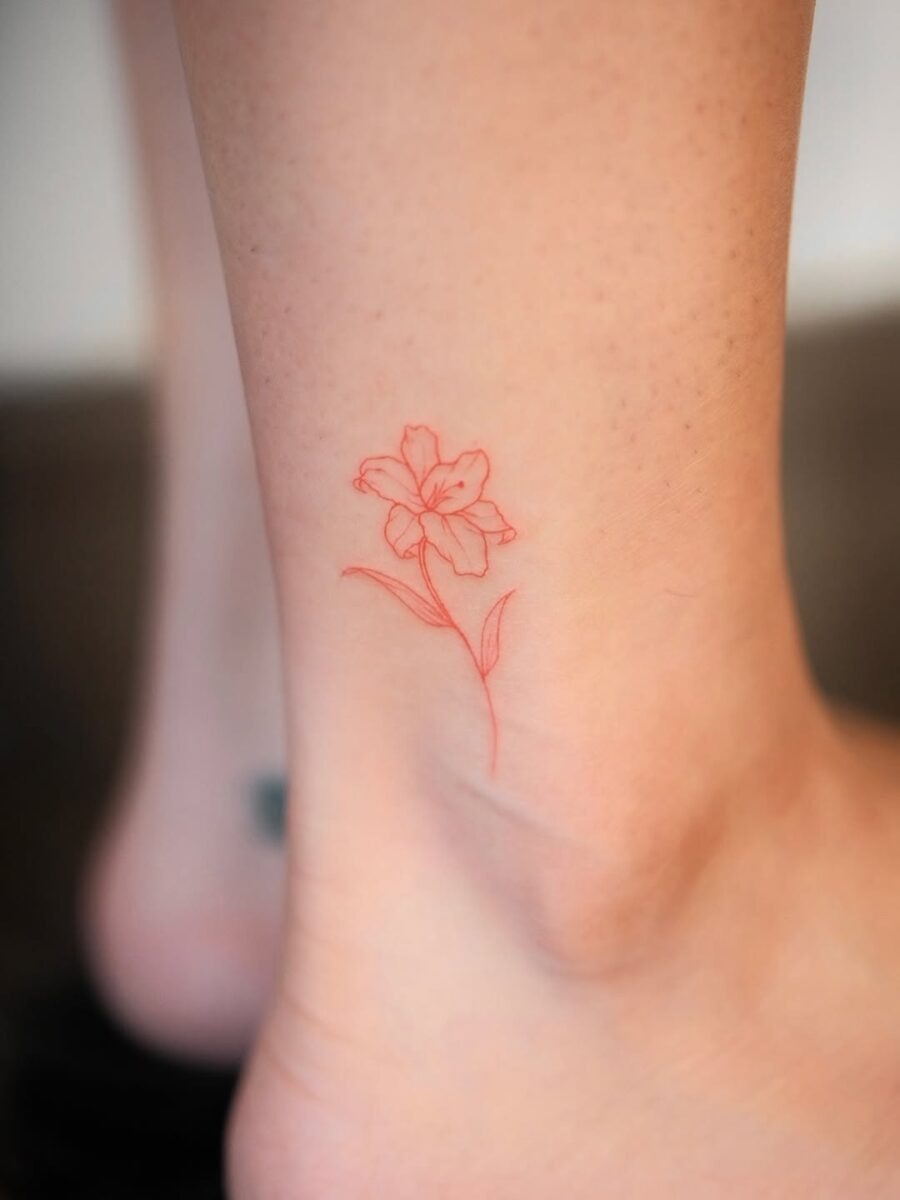 Delicate red flower ankle tattoo Piece Tattoo Design