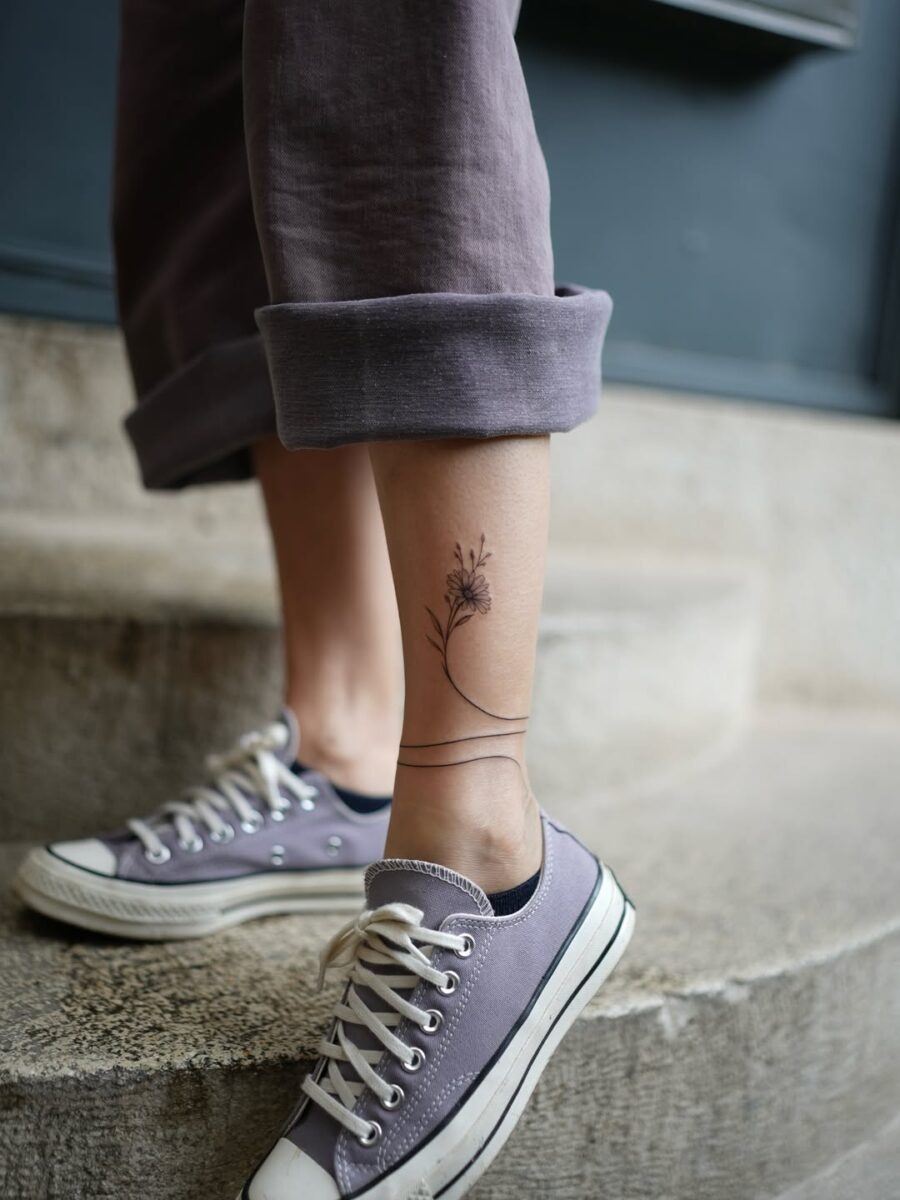 Elegant floral tattoo for a subtle vibe Tattoo Design