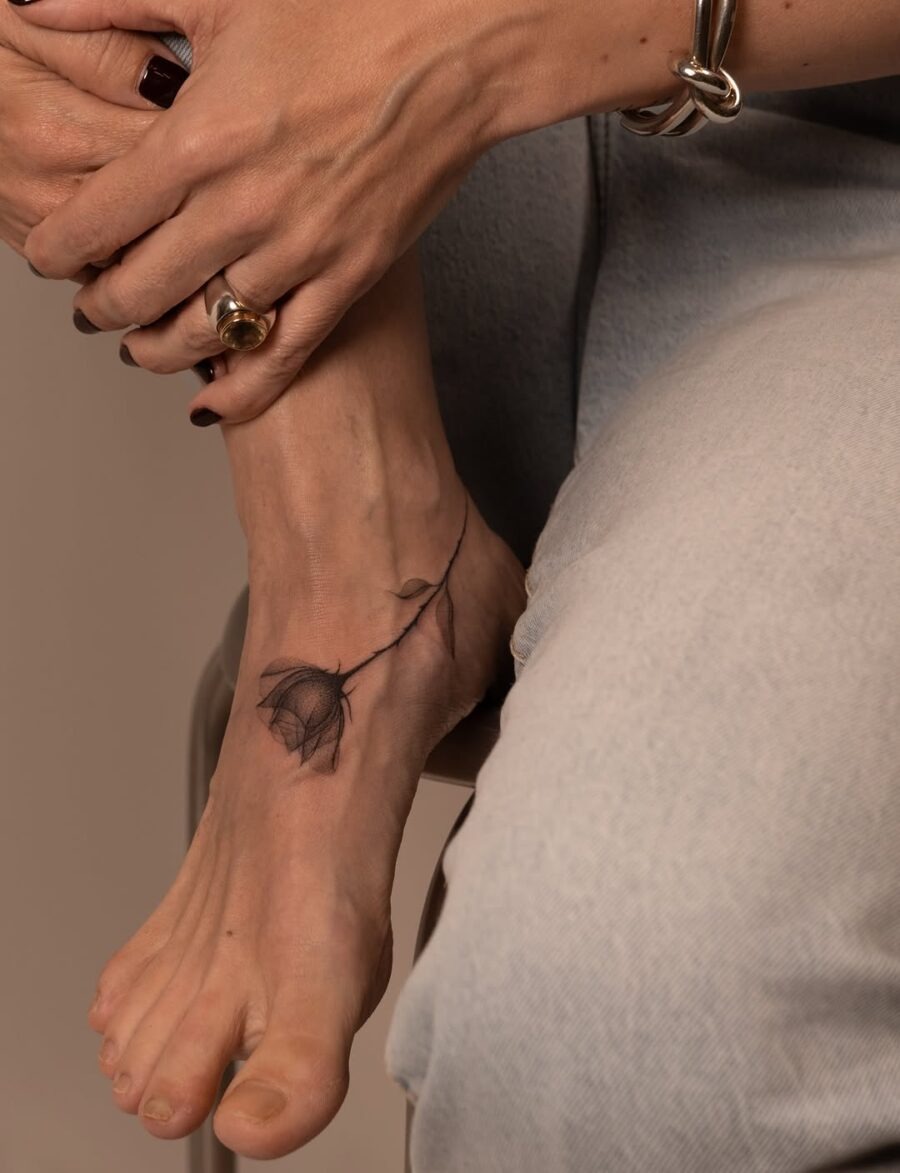 Stunning floral ankle tattoo for a graceful touch Tattoo Design