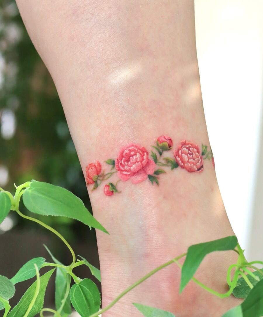 Stunning pink floral design around the ankle Tattoo Design