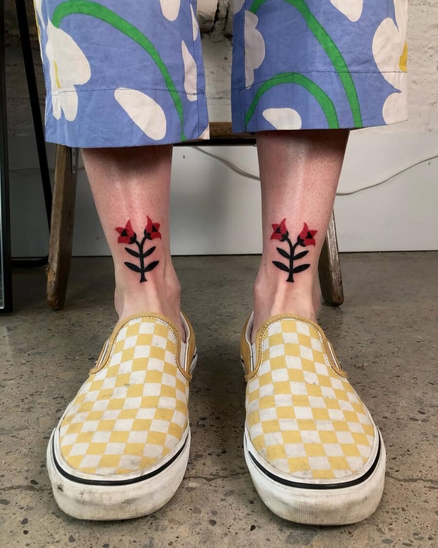 Vibrant floral ankle tattoos with bold colors Tattoo Design