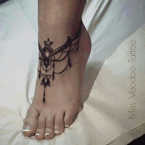A Chandelier on a Foot Tattoo Design