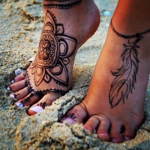 Beautiful Flora Drawings on a Woman’s Feet Tattoo Design