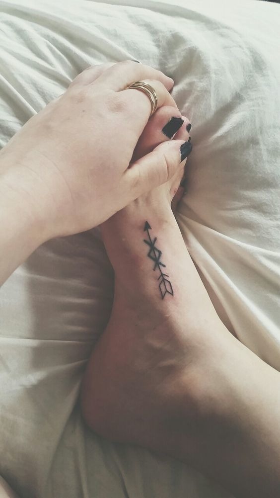Rigid Arrow Design Tattoo Design